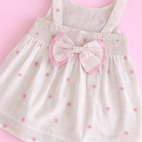 Off White Frock with Pink  Bow