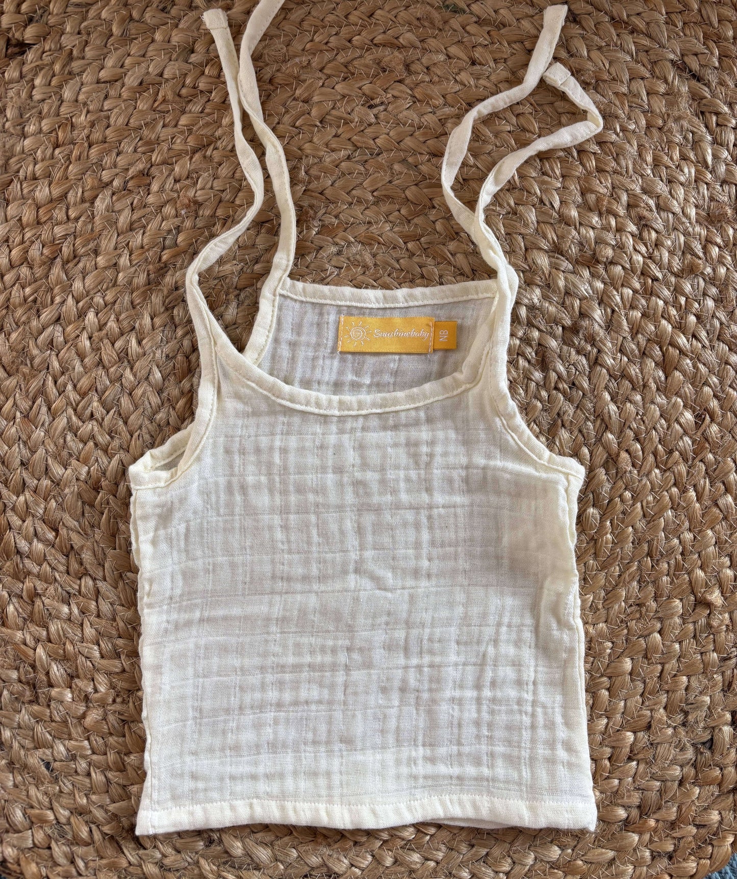 Newborn unisex easy wear top in soft muslin cotton, ideal for post-oil massage and summer comfort.